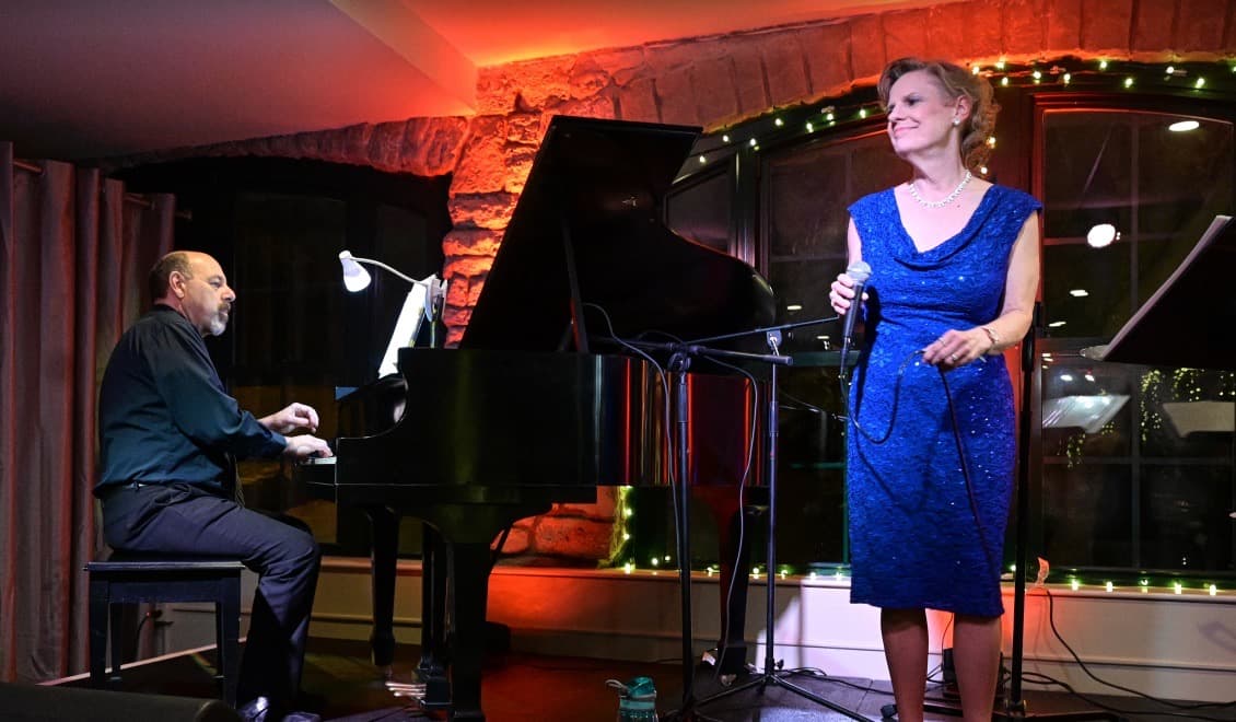 Ann Mitchell performing alongside pianist John Gabriele
